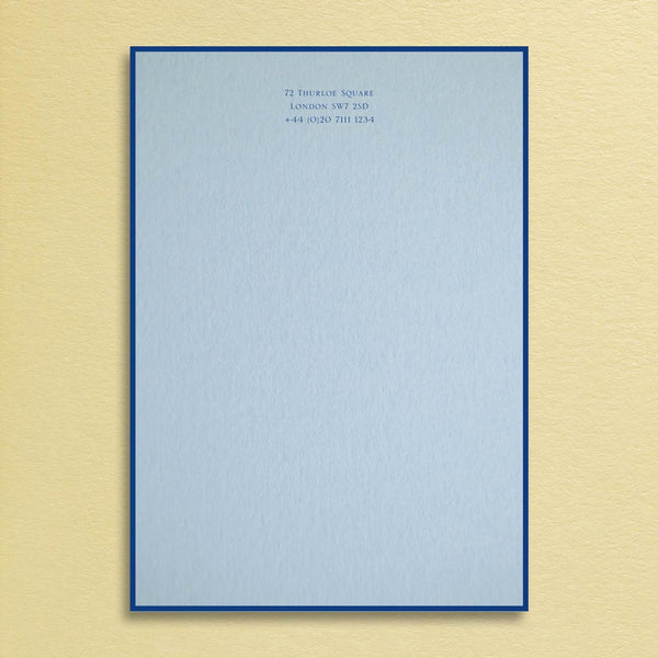 The Bond letter headed paper shows your personalised text printed in dark blue onto a light blue sheet with a matching border.