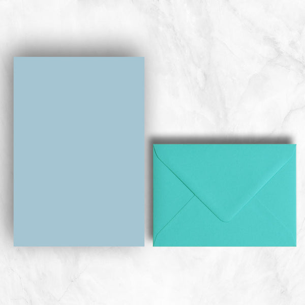 Plain lightly textured azure blue a5 writing sheets teamed with bright turquoise envelopes