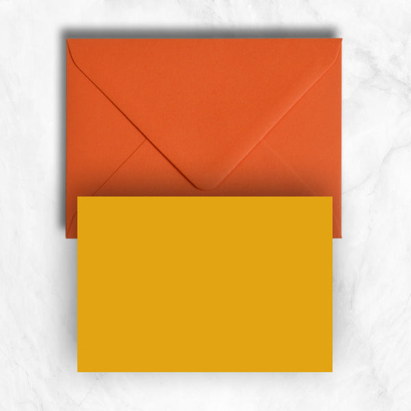Plain lightly textured citrine yellow a6 cards and orange envelopes