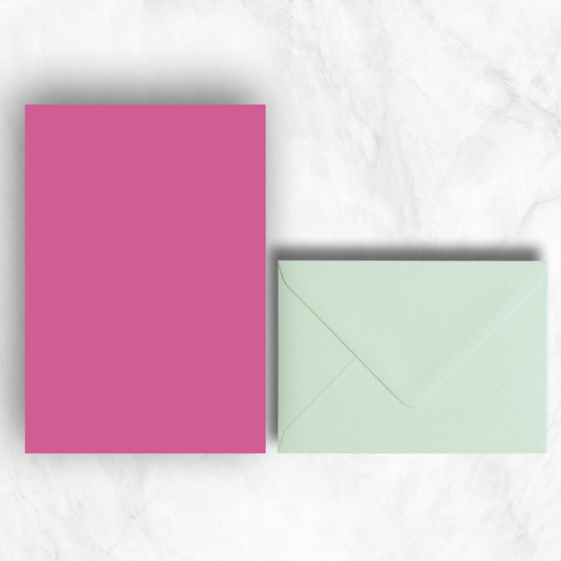 Plain lightly textured Hot pink a5 sheets teamed with powder green envelopes