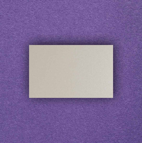 These Pearlescent finish cream wedding escort cards have a shine finish and come in packs of 20