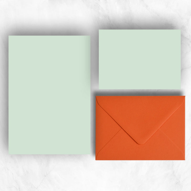 Powder green A5 Sheets and A6 Note cards paired with contrasting orange envelopes