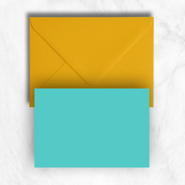 Plain lightly textured turquoise a6 cards teamed with citrine envelopes