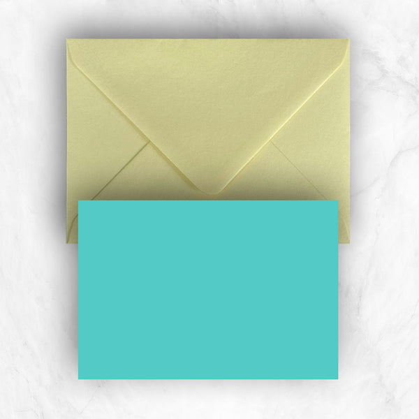 Plain lightly textured turquoise a6 cards teamed with yellow envelopes