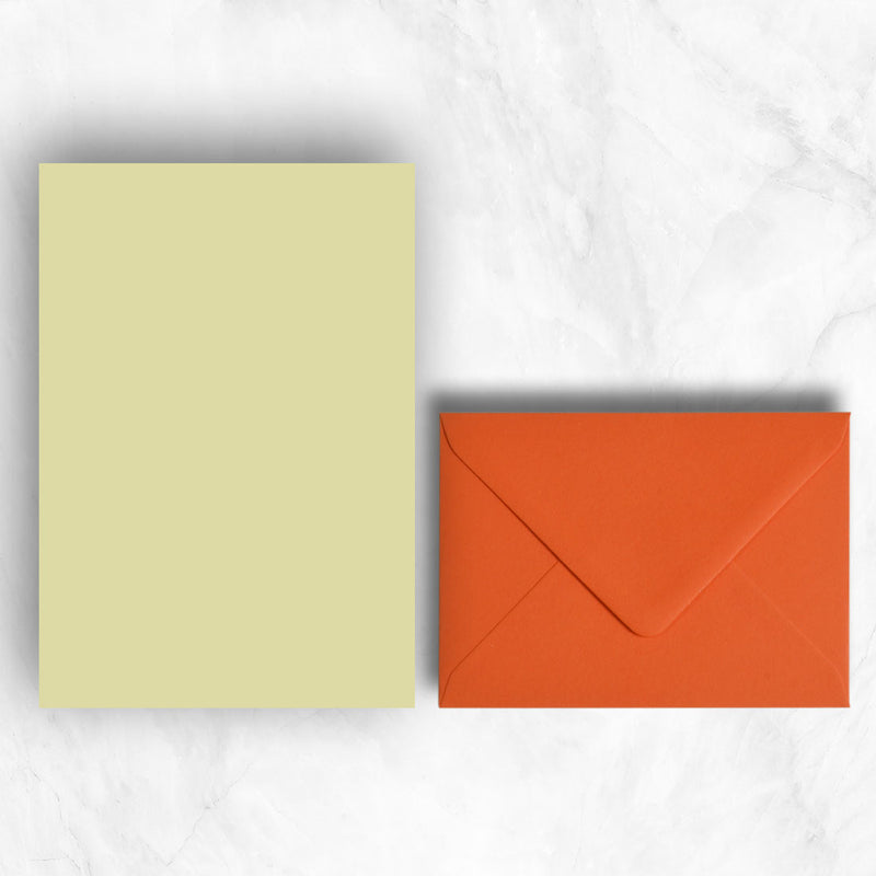 Plain lightly textured yellow a5 sheets teamed Mandarin orange envelopes
