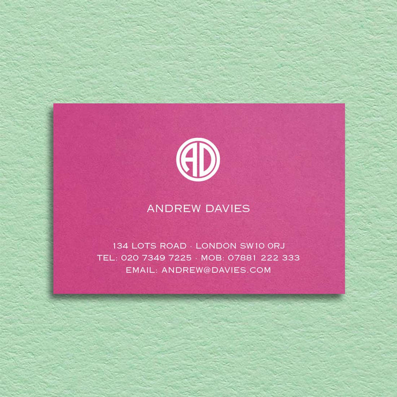 A punchy pink card provides the perfect backdrop for this contemporary design