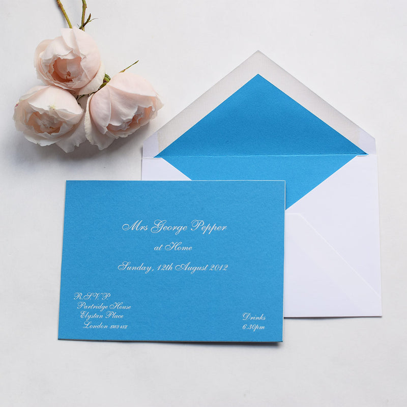 The Cliveden at home invitation cards, are engraved in white ink onto colorplan Tabriz blue with white edges