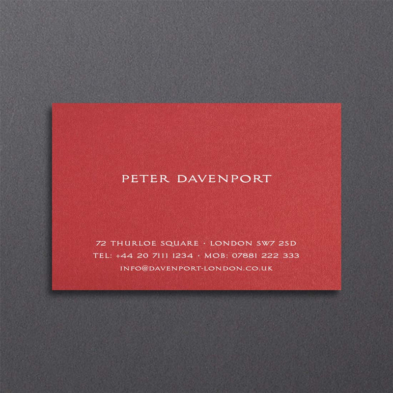 A classic layout on this bright red card with your name centres and address at foot in white ink