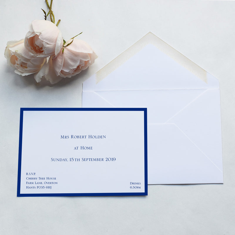 The Hampton at home invitation cards, printed in dark blue with matching borders onto 400gsm white card