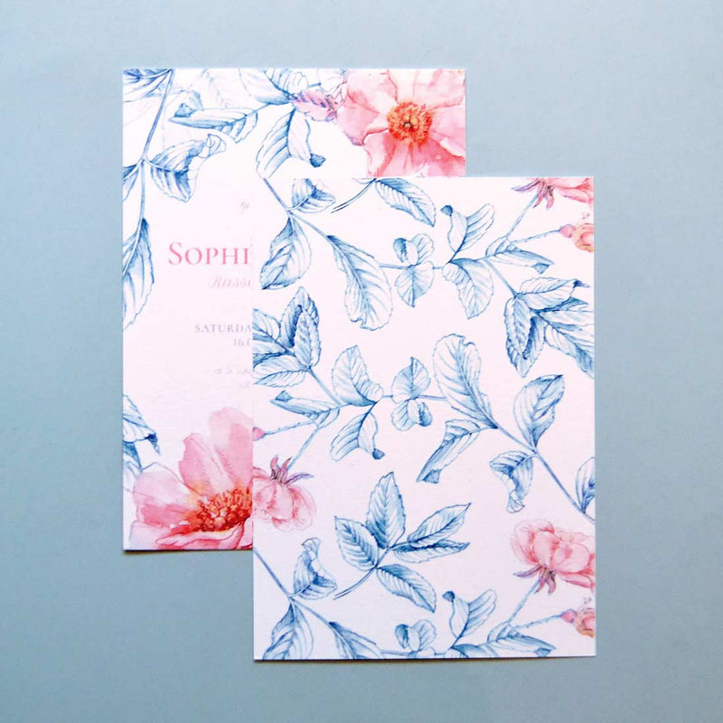 The Kew wedding invitation, uses the bold blooms and foliage from the front as a pattern printed on the reverse