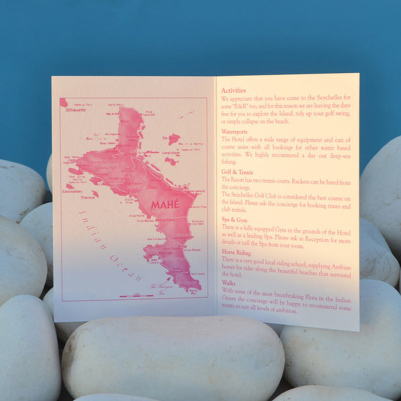 The Maia wedding information card printed both sides of a folded card in matching fuchsia pink 
