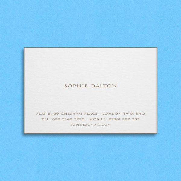The Rose visiting cards show the text engraved in gold with matching foiled edges on a white card