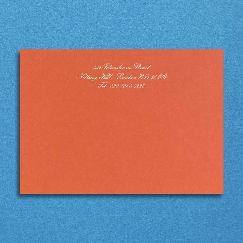 Printed in white onto a mandarin orange card with your details centred at the head of the card