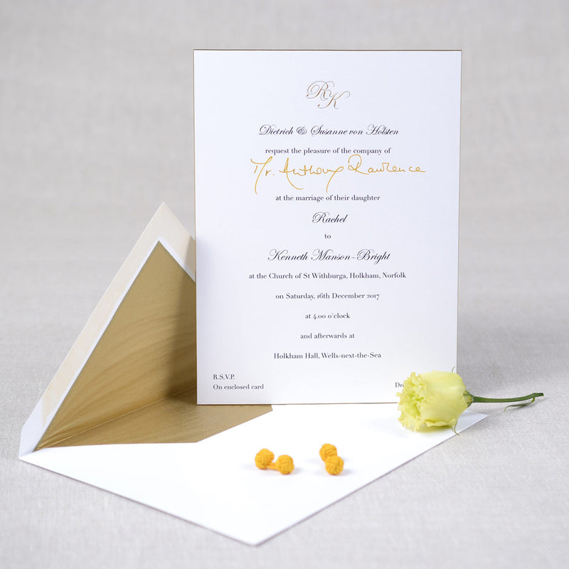 The Holkham engraved wedding invitations come with a metallic monogram and matching tissue paper lined envelopes