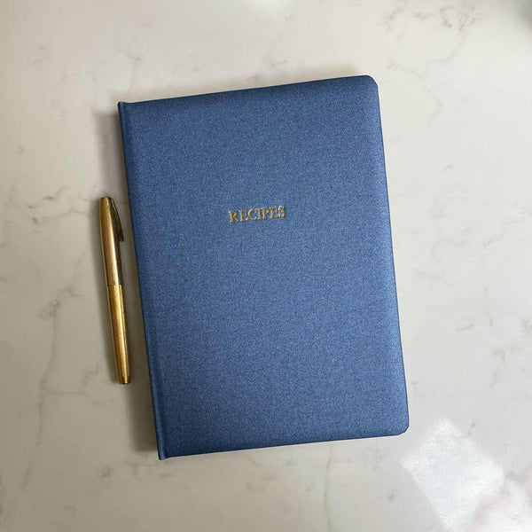 Our sapphire blue recipe book can have the cover personalised