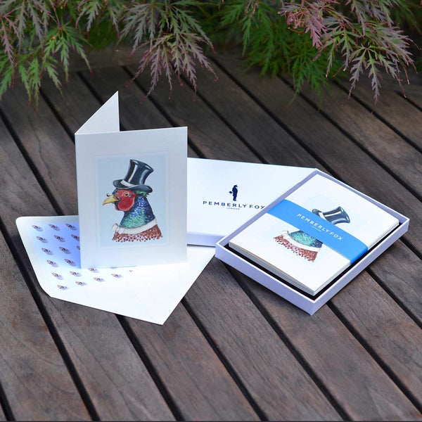 the phileas pheasant feather greeting cards with feather pattern printed paper lined envelopes, sold in pemberly fox boxes
