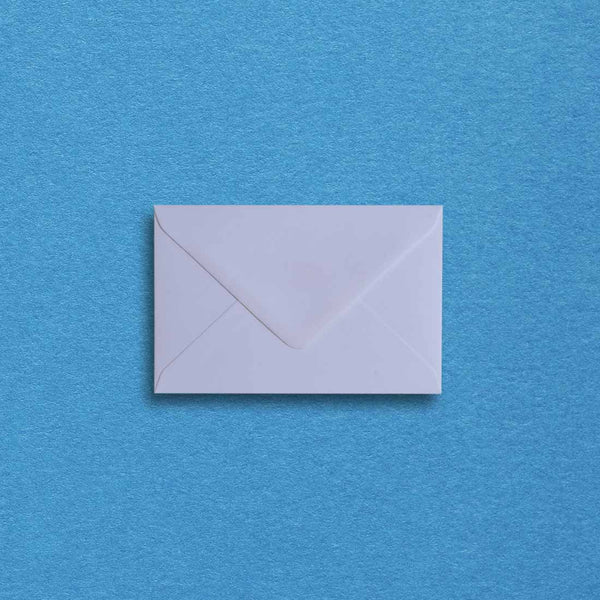 using a softly textured 135gsm paper, these small white envelopes have a diamond flap