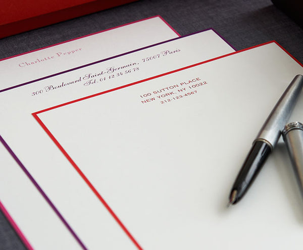 Writing paper and pens