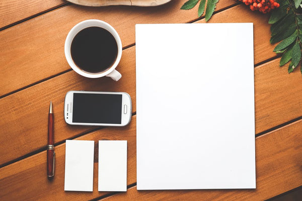 a picture of plain card and paper before thinking about your business stationery