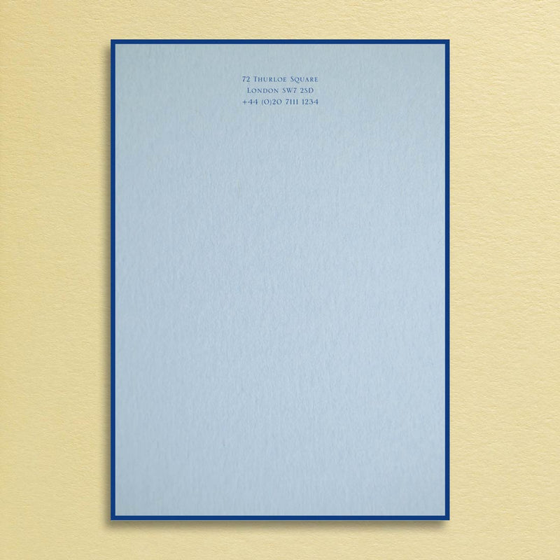 The Bond letter headed paper shows your personalised text printed in dark blue onto a light blue sheet with a matching border.