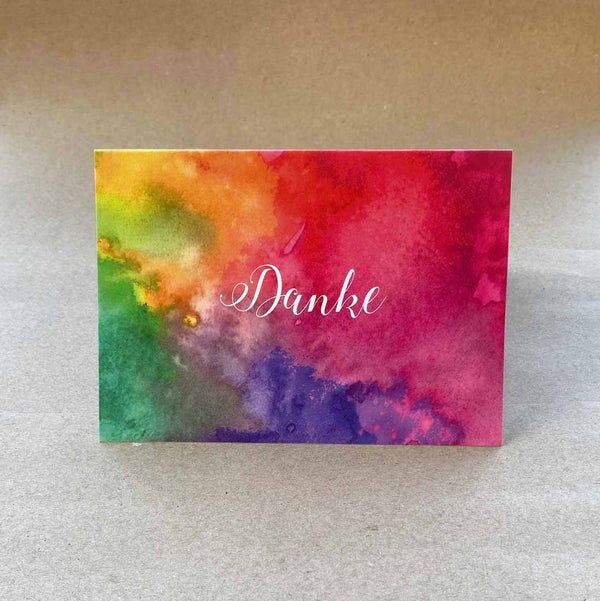 Folded cards with a bold coloured wash on the front cover with German language 'thank you'. Sold in packs of 6 with matching white envelopes.