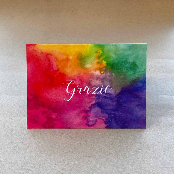 Folded cards with a bold coloured wash on the front cover with Italian language 'thank you'. Sold in packs of 6 with matching white envelopes.