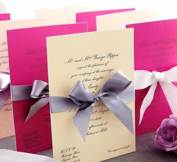 Beautiful engraved luxury wedding invitations with ribbons