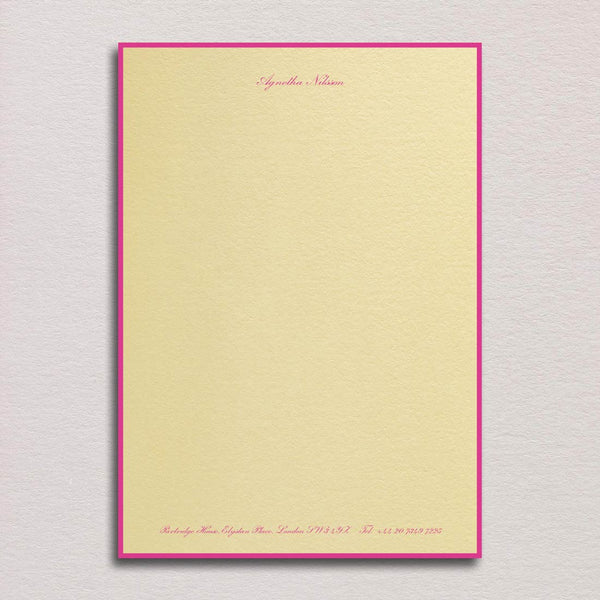 Elegantly bordered letterhead and the use of shocking pink font colour on the sorbet yellow paper is a true statement