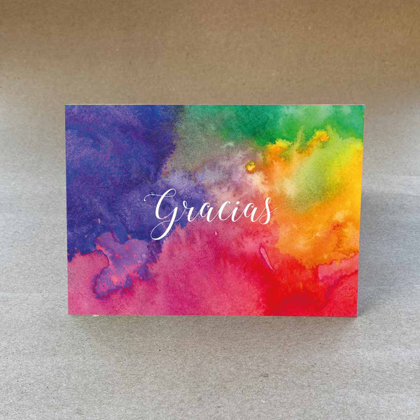 Folded cards with a bold coloured wash on the front cover with spanish language 'thank you'. Sold in packs of 6 with matching white envelopes.