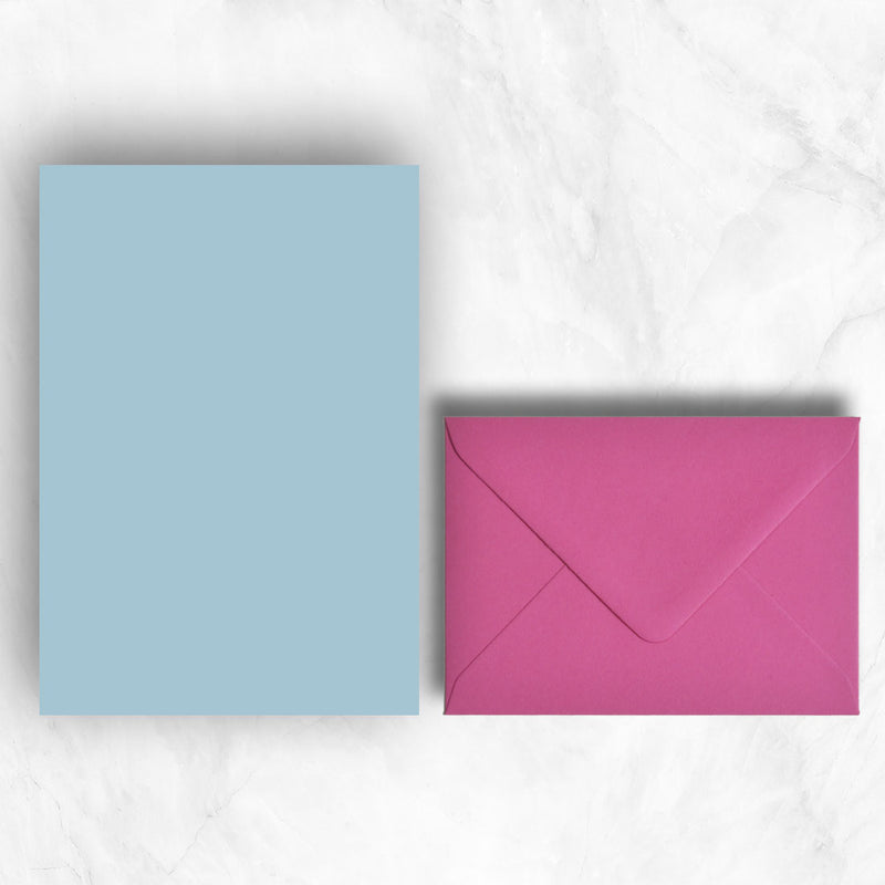 Plain lightly textured azure blue a5 writing sheets teamed with hot pink envelopes