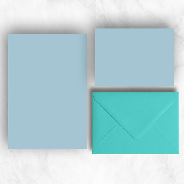 Plain lightly textured azure blue a6 cards and a5 writing sheets teamed with complementary turquoise envelopes
