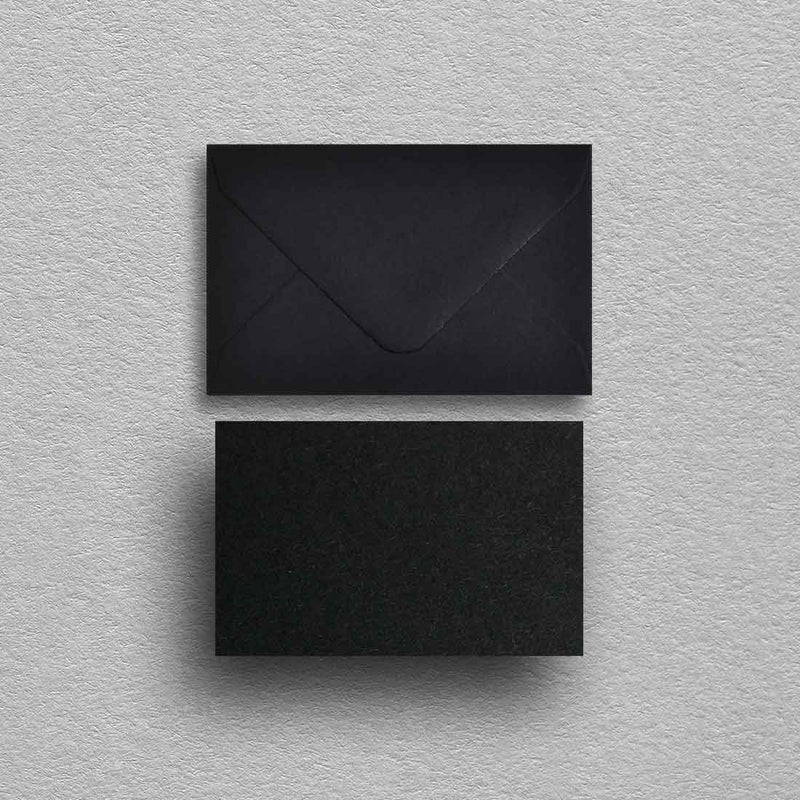 Our black wedding escort cards and envelopes are made from textured colorplan ebony 