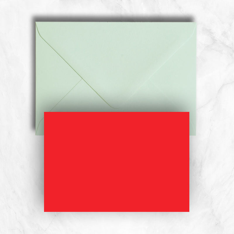 Plain lightly textured bright red a6 cards teamed with soft powder green envelopes