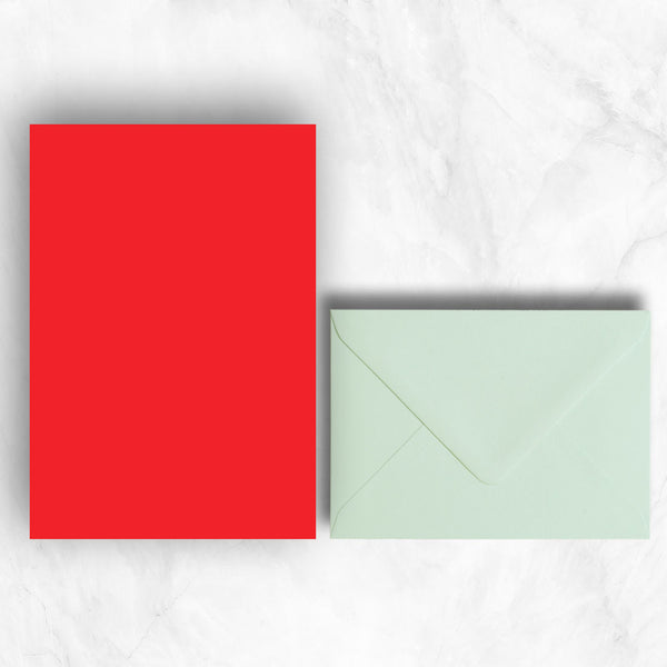 Plain lightly textured red a5 writing sheets teamed with powder green envelopes