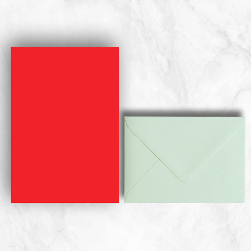 Plain lightly textured red a5 writing sheets teamed with powder green envelopes