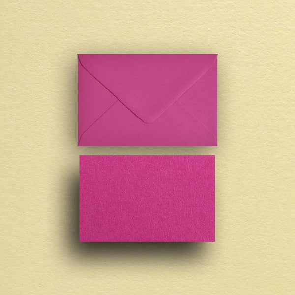 Our hot pink escort cards and envelopes are made from textured Colorplan Fuchsia and are suited to specialist writing inks 