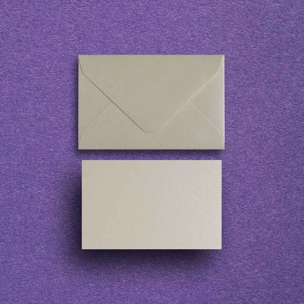 Our pearlescent cream escort cards and envelopes are made from a smooth Peregrina card and paper and suitable for most writing implements