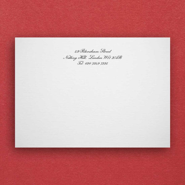 the plumton embossed note card, shown on a white A6 card with address and phone number in a script font at the head