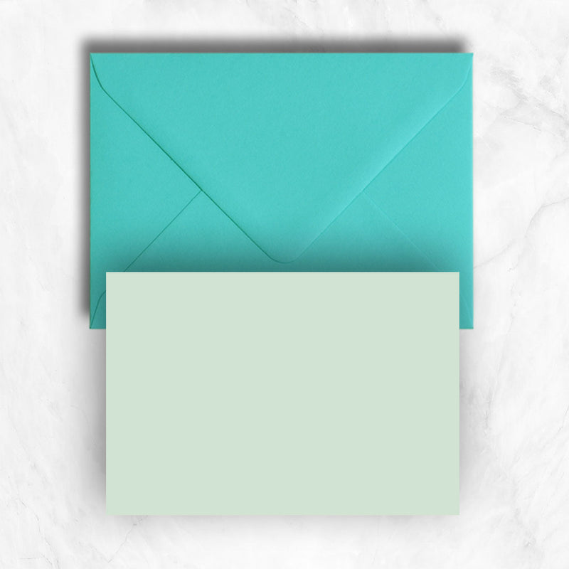 Plain lightly textured pastel powder green a6 cards teamed with turquoise envelopes