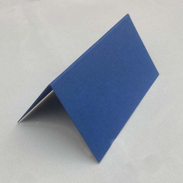 Made from an stunning sapphire blue pink 350gsm card, these folded place cards are sold in packs of 20
