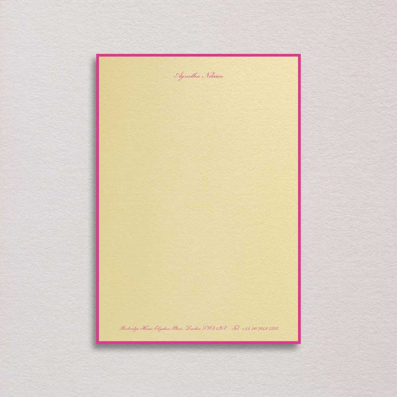 Elegantly bordered writing paper and the use of shocking pink font colour on the sorbet yellow paper is a true statement