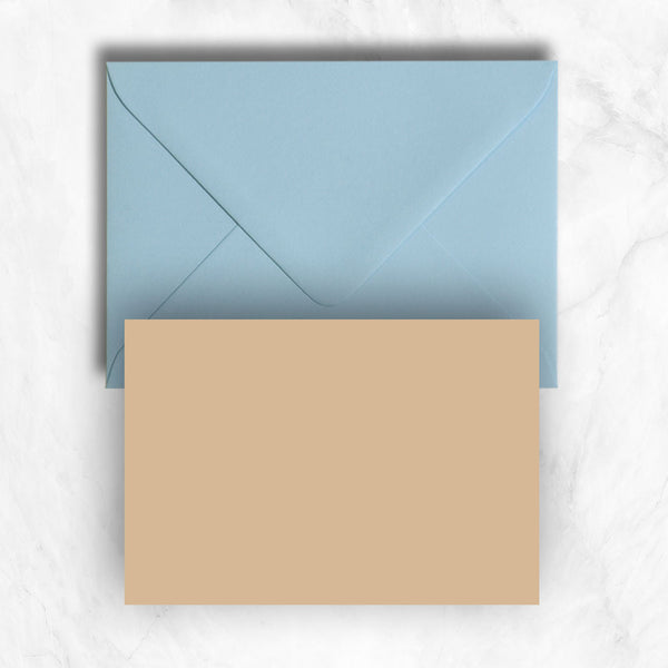 Plain lightly textured pastel brown a6 cards teamed with azure blue envelopes
