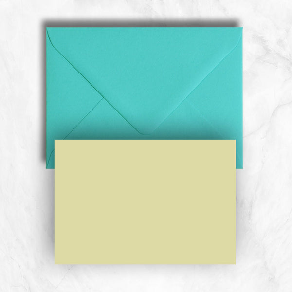 Plain lightly textured yellow a6 cards teamed with turquoise envelopes