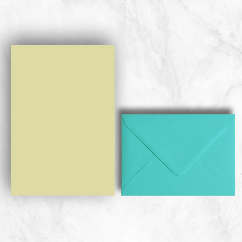 Plain lightly textured yellow a5 sheets teamed with turquoise blue envelopes