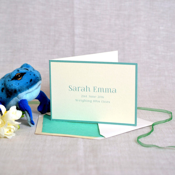 The Abersoch personalised new baby cards, showing softly rounded font and aqua borders