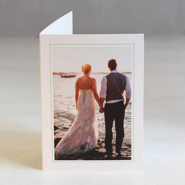 The Amalfi wedding photo thank you cards show an image on the front page with a thin turquoise border