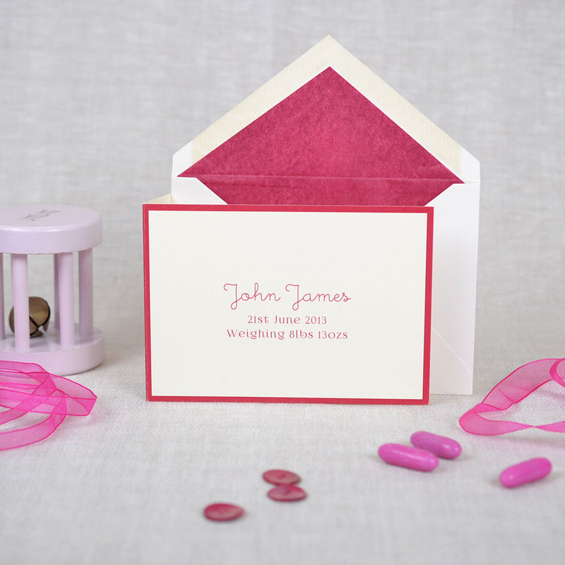 The folded Ambleside birth announcement cards and envelope with burgundy tissue paper lining
