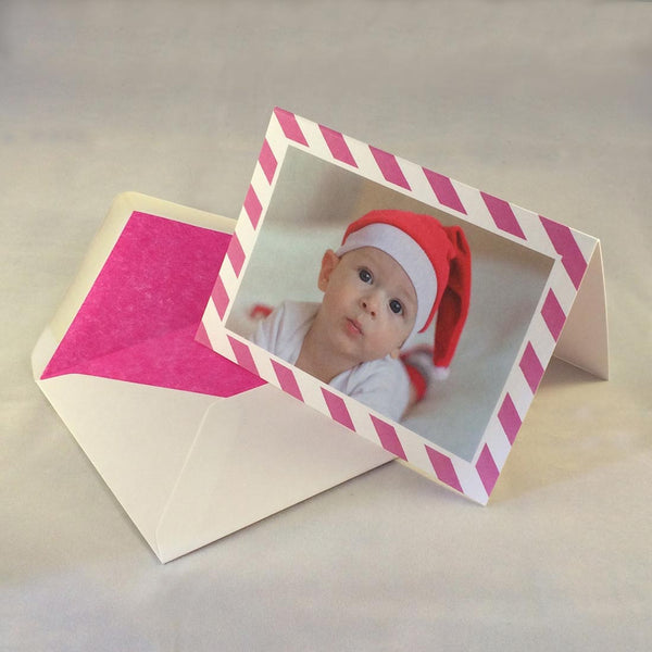 The Amelia baby girl thank you cards, showing stripe borders which match the hat the baby is wearing