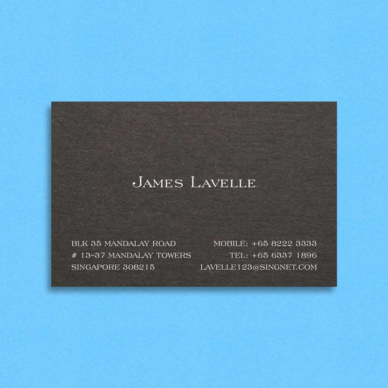 The Arlington visiting cards show white ink engraved onto a black card