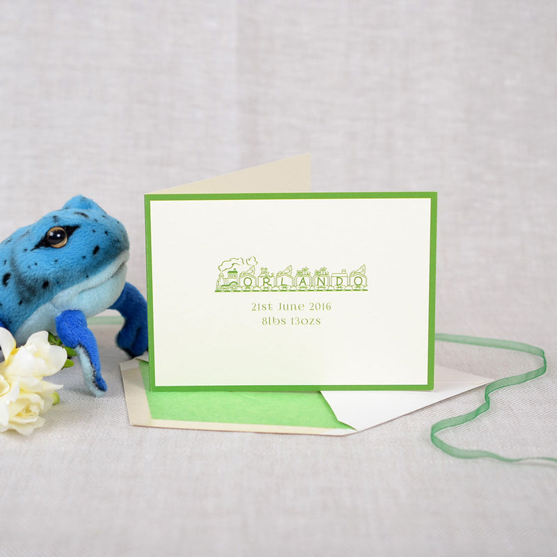The Barrington personalised new baby cards, showing a train font and bright green borders